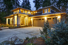 Luxurious New Construction Home Exterior At Sunset