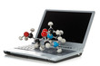 Ball and stick chemical molecule model on laptop computer keyboa