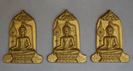 Wall Mural - Three Buddha on Gray wall background.