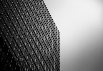 windows of commercial building in Hong Kong with B&W color