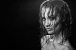 © tugolukof - beautiful woman with wet hair looking at camera, monochrome image
