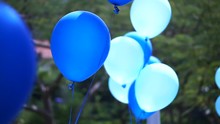 Blue Party Balloons Floating At Outdoor Terrace, Fun And Bright Day For Celebration