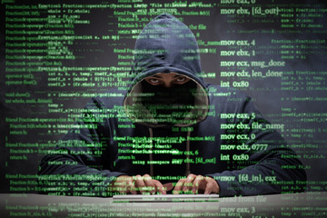 young hacker in data security concept