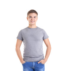 Wall Mural - Handsome young man in blank grey t-shirt on white background