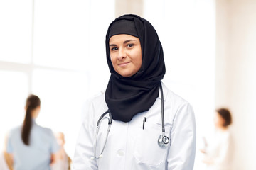 Wall Mural - muslim female doctor in hijab with stethoscope