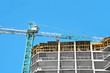 © Unkas Photo - Crane and highrise construction site