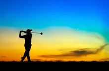 Silhouette Golfer Playing Golf During Beautiful Sunset