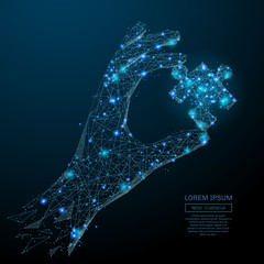 Leinwandbilder - Abstract image of a hand holding puzzle in the form of a starry sky or space, consisting of points, lines, and shapes in the form of planets, stars and the universe. Vector business wireframe concept.