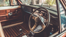 Antique Grunge Steering Wheel In The Old Car In Vintage Style Picture.