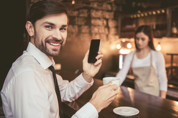 Poster - Businessman at the cafe