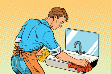 Home cleaning washing kitchen sinks, man works