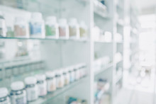Pharmacy Blurred Light Tone With Store Drugs Shelves Interior Background, Concept Of Pharmacist And Chemist.