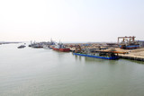 Fototapeta  - busy shipyard dock and docked ships
