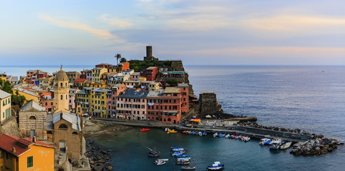 Wall Mural - Colorful traditional houses on a rock over Mediterranean sea on