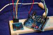 © goodcatfelix - educational table top experiment with popular arduino microcontroller and smal OLED display saying: working with arduino is fun