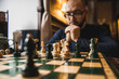 © sushytska - Man playing chess