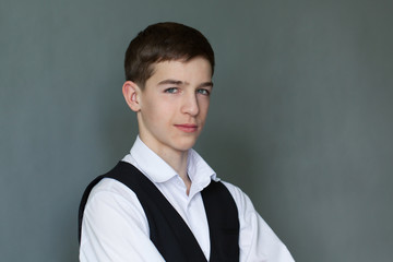 Wall Mural - Portrait of happy schoolboy teenager