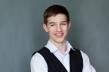 Wall Mural - Portrait of happy schoolboy teenager