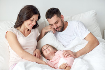 Sticker - happy family in bed at home