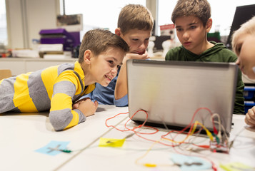 Wall Mural - kids, laptop and invention kit at robotics school