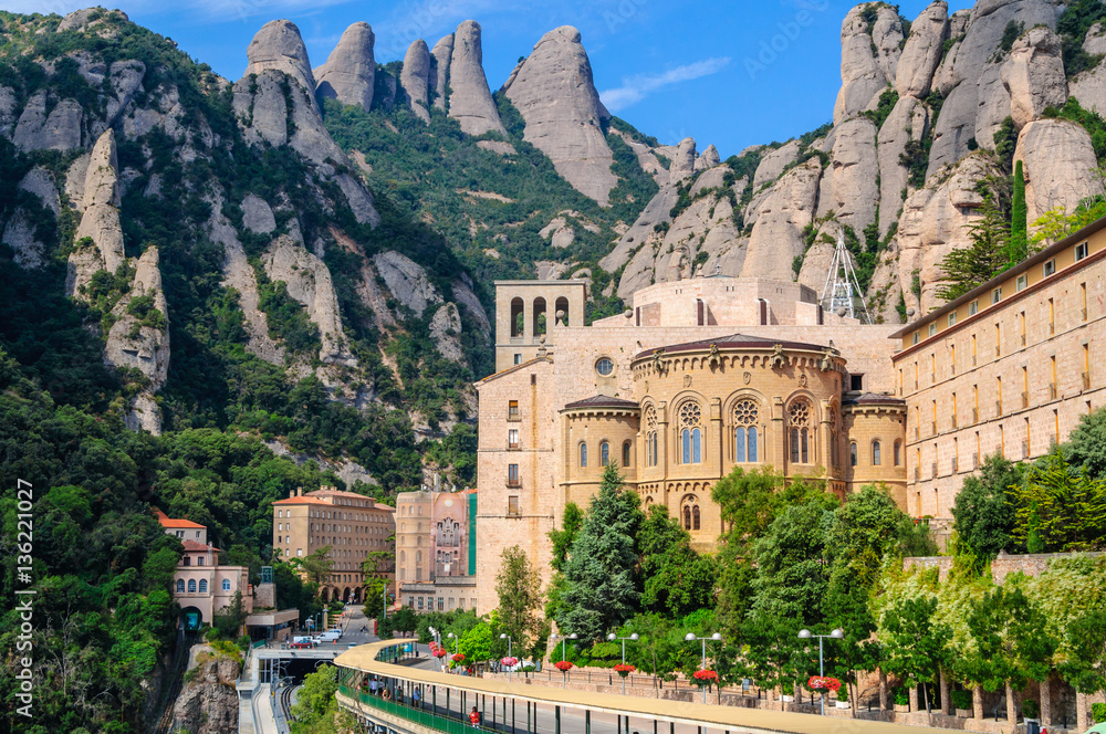 View the famous Catholic monastery of Montserrat on the backgrou - obrazy, fototapety, plakaty 