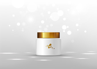 Cosmetic bottle for cream. White jar and gold glossy lid on the light gray background for ads.