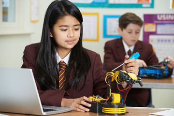 Pupils In Science Lesson Studying Robotics