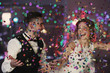 © Africa Studio - Cute happy wedding couple against defocused lights