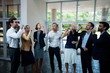 © WavebreakMediaMicro - Business executives having champagne at conference center