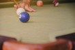© Bankerd - Young Person Playing Snooker - Action on a Billiards table