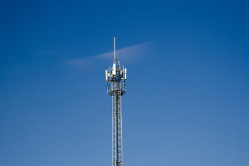 Wall Mural - Mobile phone communication tower transmission  signal with blue