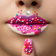 Close Up View Of Female Lips With Sweet Donut Makeup