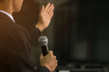 blurred of smart businessman speech, talking with microphone, gr