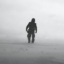 Black And White Photo Of Man In Snow Storm