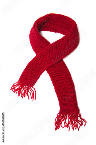 Fotografie, Obraz Red knitted scarf on a white background.