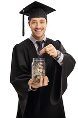 Canvas Print - Graduate student putting a coin into a jar