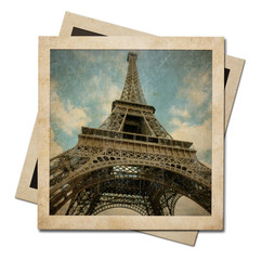 Vintage instant photo paper frames with Eiffel tower shot isolated