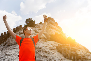 Successful man near mountain scenery