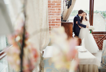 Wall Mural - Wonderful couple in a restaurant