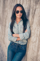 Poster - Happy smiling young woman in glasses with crossed hands