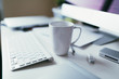 © ZeroThree - Computer desk with coffee mug