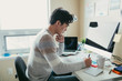 © ZeroThree - Man Working At His Desk