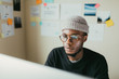 © ZeroThree - African American Man Working On His Computer