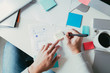 © ZeroThree - Overhead View of Man Working At A Desk