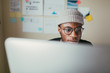 © ZeroThree - African American Man Working On His Computer