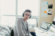 © ZeroThree - Listening to music and working