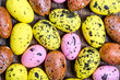 Colorful easter eggs on wooden background, overhead