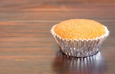 Banana cupcake on wooden table