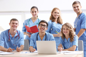 Sticker - Group of medical students having lecture indoors