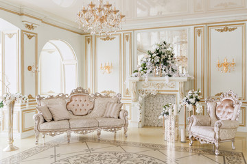 Luxurious vintage interior with fireplace in the aristocratic style